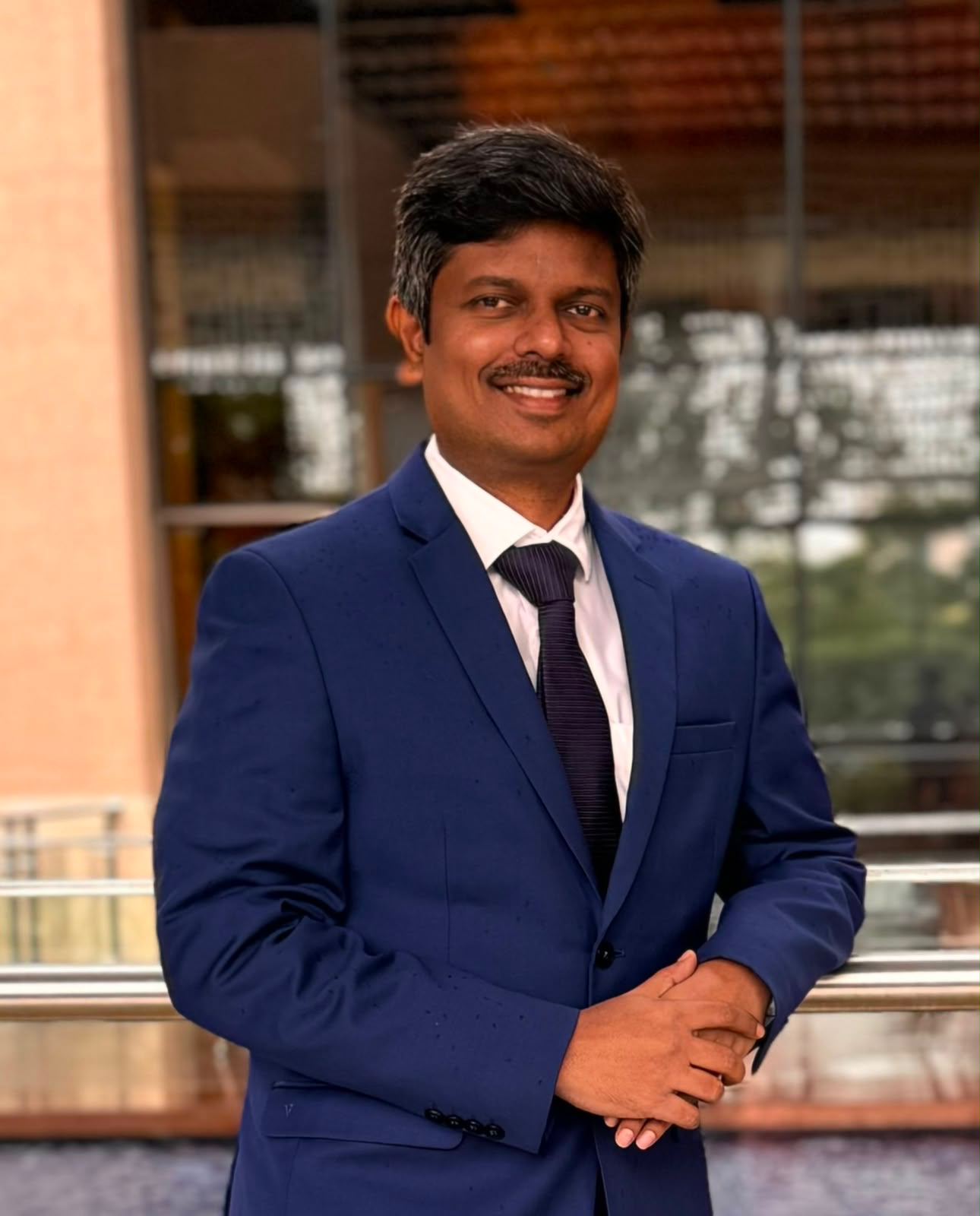 Dr. Vignesh Karthik